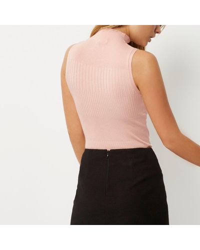 hot pink sleeveless turtleneck