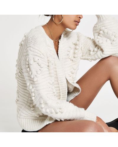 white bobble cardigan