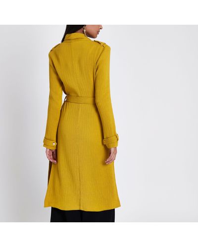 mustard belted coat