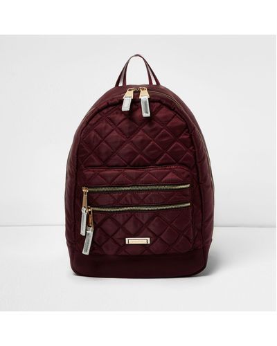 red quilted backpack