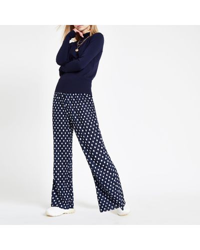 Navy Spot Print Plisse Flare Trousers 