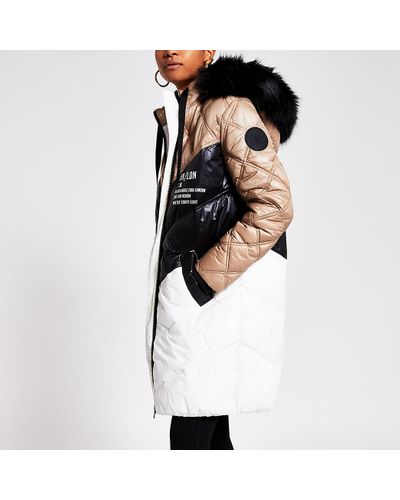 cream quilted coat