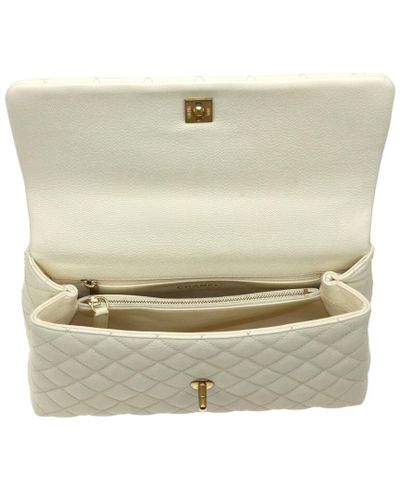 Chanel Beige Quilted Caviar Leather Medium Coco Lizard Handle Bag In Natural Lyst Chanel Beige Quilted Caviar Leather Medium Coco Lizard Handle Bag In Natural Lyst