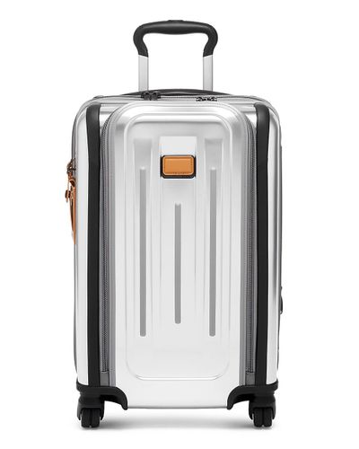tumi silver suitcase