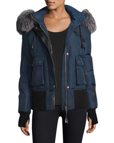 sweat the north face bleu Cinosural International School