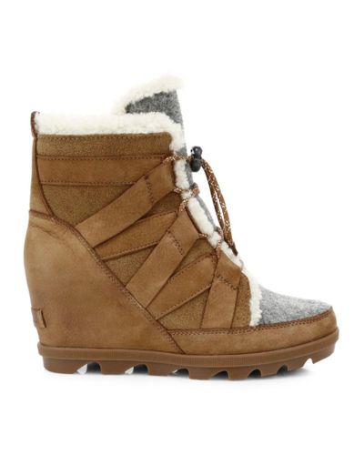 joan of arctic ii shearling wedge boots