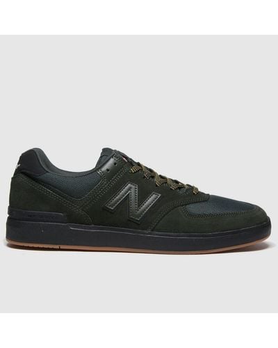 dark green 574 trainers