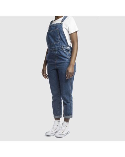 white leather converse with rose gold eyelets