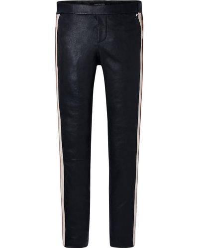 white pants with black side stripe