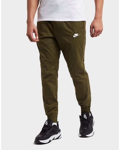 Nike Cotton Twill Cuffed Track Pants in Green for Men - Lyst