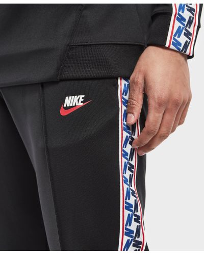 nike taped poly track