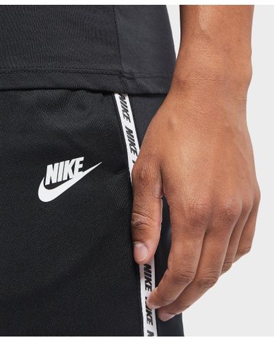 nike gel tape cuffed track