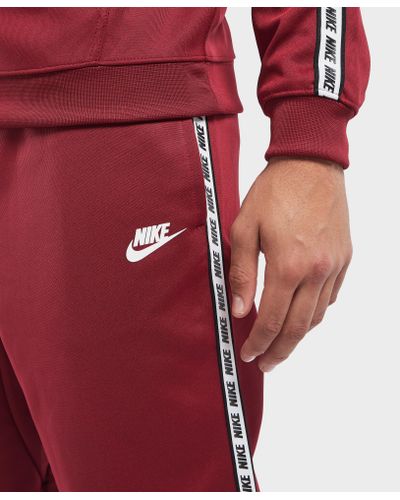 nike gel tape cuffed track pants