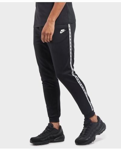 nike gel tape cuffed track pants