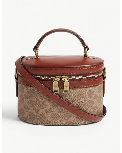 coach trail bag signature