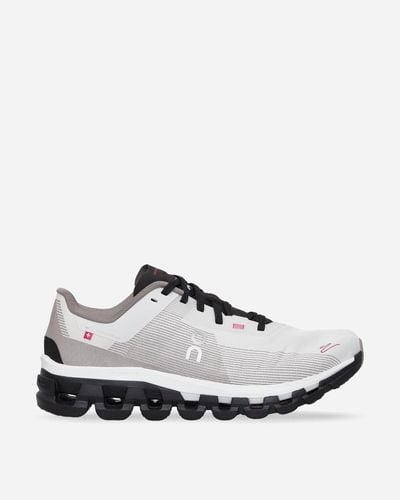 On Shoes Cloudflow 4 Distance Trainers Black / White