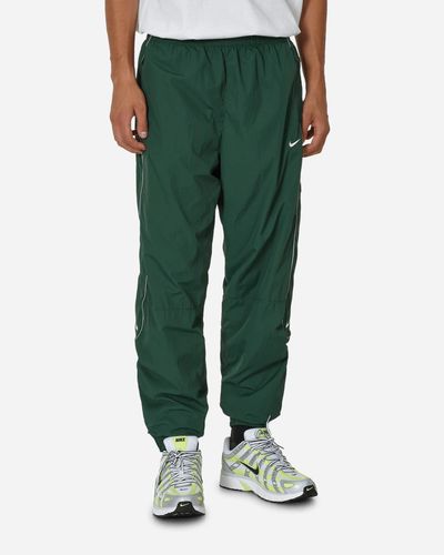 Nike Solo Swoosh Woven Track Pants Green for Men | Lyst