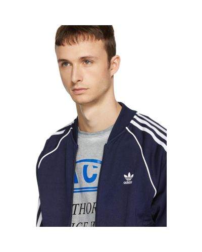 sky blue adidas track top