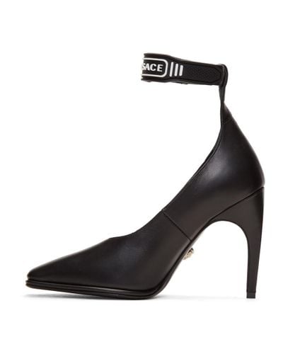 Versace Leather Black & White Logo Strap Heels - Lyst