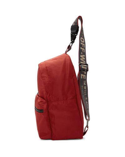 red backpack with white straps