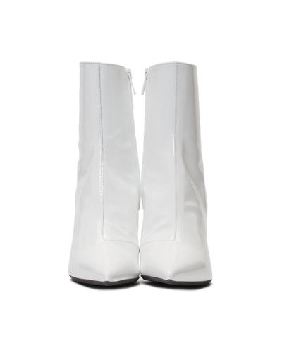 white vinyl boots