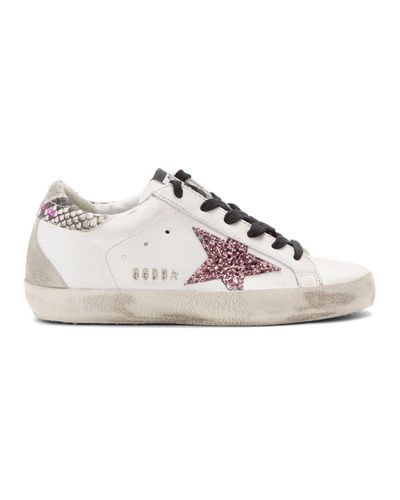 snakeskin star design lace up sneakers