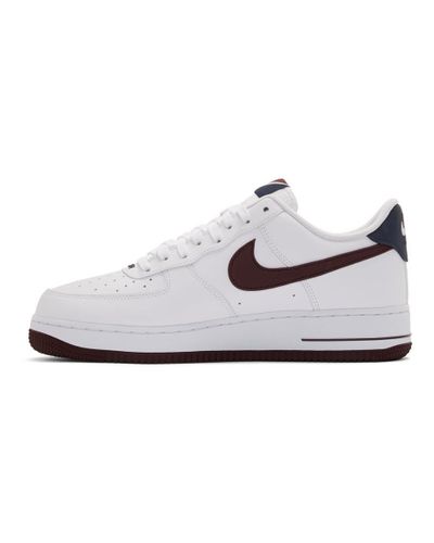 burgundy and white nikes