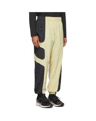 nike beige track pants