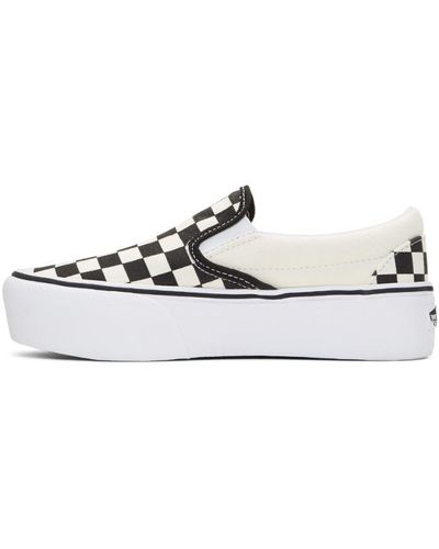 black and off white checkered vans