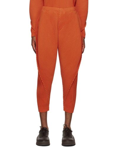 Homme Plissé Issey Miyake Orange Arc Trousers for Men | Lyst