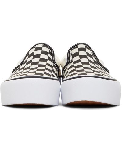 black and off white checkered vans