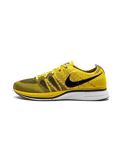 nike flyknit trainer yellow