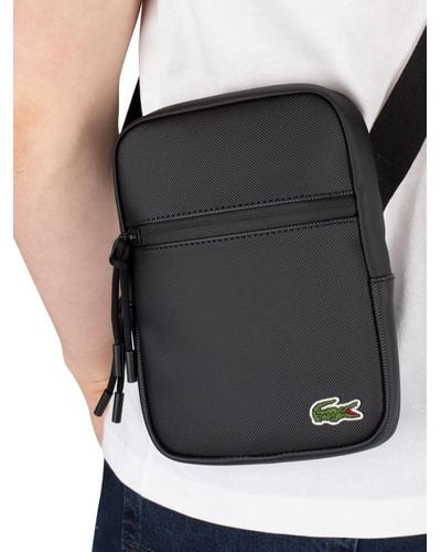lacoste flat crossover bag