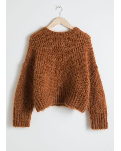 orange chunky knit sweater