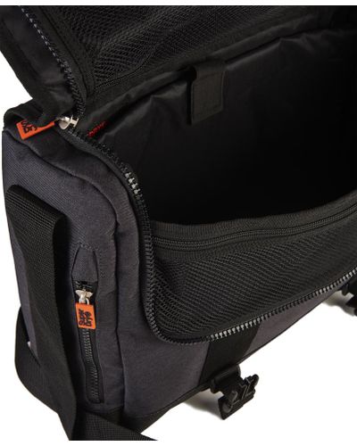 superdry embossed messenger bag