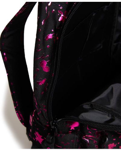 superdry rose gold splatter backpack