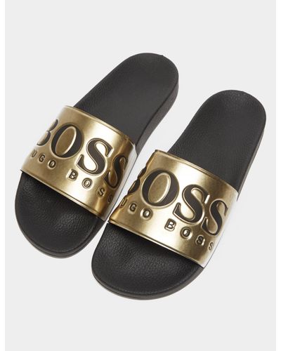 gold hugo boss sliders
