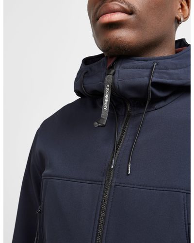 cp company softshell goggle jacket blue