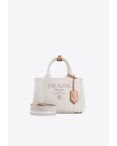 Prada Logo-embroidered Tote Bag In Linen Blend - White