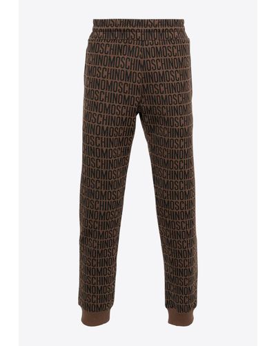 Moschino All-Over Logo Track Pants - Brown