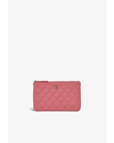 Chanel Timeless Clutch Bag In Rose Caviar Leather With Pale Gold Hardware - Pink