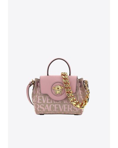 Versace Small La Medusa Logo Jacquard Top Handle Bag - Pink
