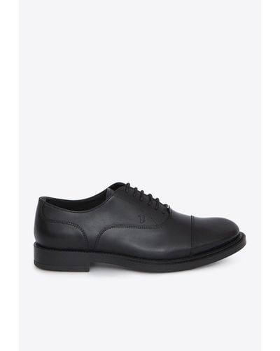 Tod's Logo-Embossed Oxford Shoes - Black