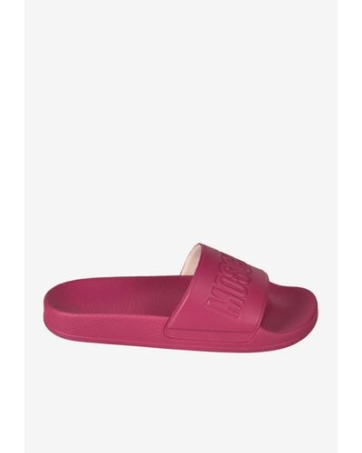 Moschino Logo Embossed Slip-on Sandals - Pink