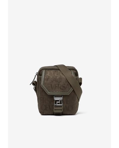 Versace All-Over Logo Jacquard Messenger Bag - Brown