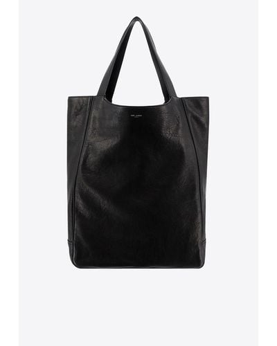 Saint Laurent Maxi Grained Leather Top Handle Bag - Black