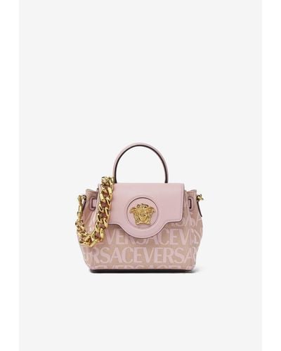 Versace Small Medusa All-Over Logo Top Handle Bag - Pink