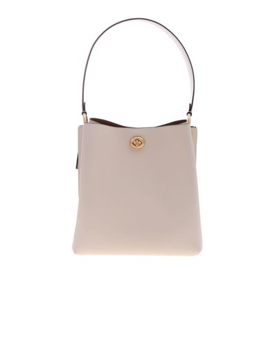 cream colored coach bag