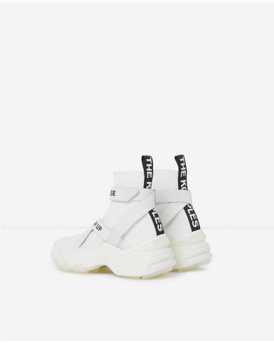 The Kooples Europe - Black urban trainers white bands | The Kooples Women