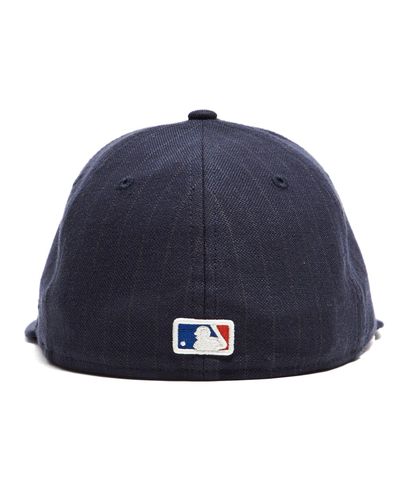 navy mets hat